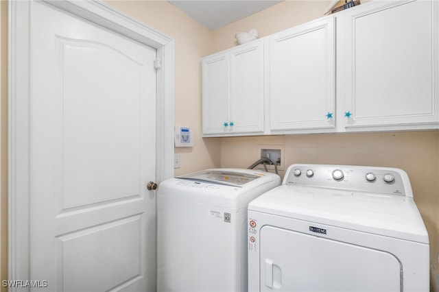 2608 NW 25th Ave, Cape Coral, FL 33993 - washroom featuring washer and dryer and cabinet space