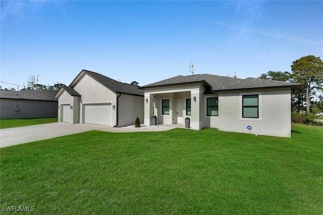 1158 E Benbow Cir, Labelle, FL 33935 - view of front of house featuring an attached garage, a front lawn, driveway, and stucco siding