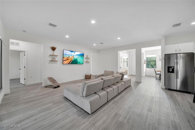 1158 E Benbow Cir, Labelle, FL 33935 - living area with light wood-type flooring, baseboards, and recessed lighting