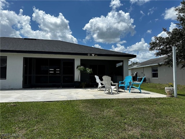 1839 Jovita Ave, Lehigh Acres, FL 33972 - rear view of property with a patio area, a lawn, and stucco siding