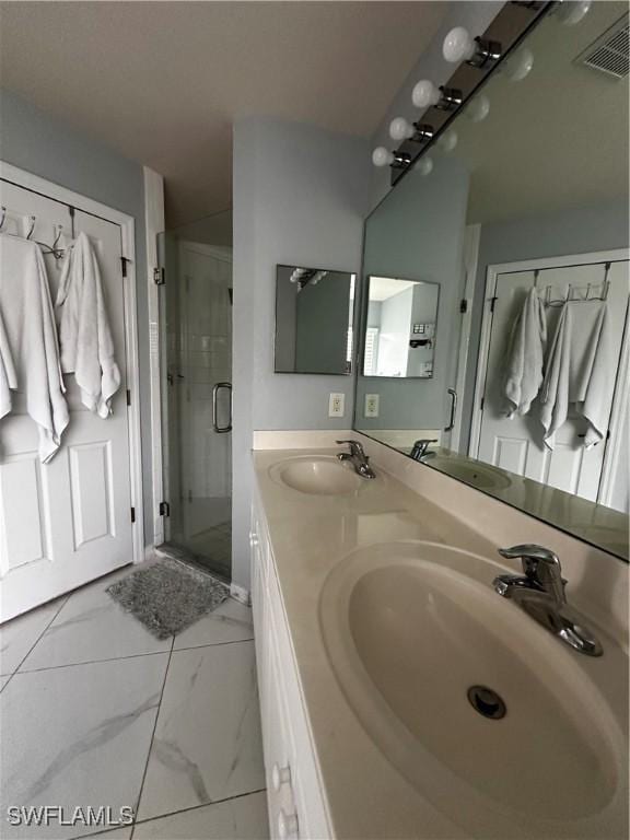 1839 Jovita Ave, Lehigh Acres, FL 33972 - full bath with a shower stall, marble finish floors, and double vanity