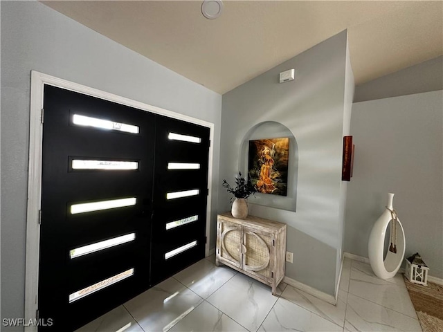 1839 Jovita Ave, Lehigh Acres, FL 33972 - entrance foyer with marble look tiles and baseboards