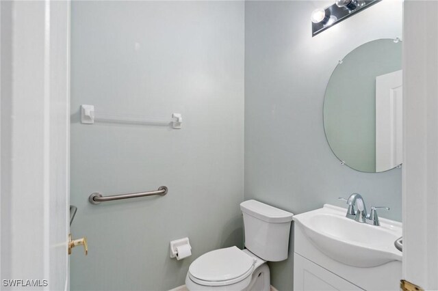 25941 Pebblecreek Dr, Bonita Springs, FL 34135 - bathroom featuring vanity and toilet