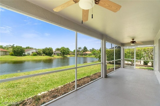 25941 Pebblecreek Dr, Bonita Springs, FL 34135 - unfurnished sunroom with ceiling fan and a water view