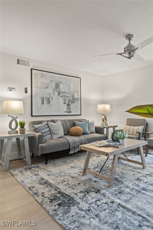 6142 Whiskey Creek Dr Unit 628, Fort Myers, FL 33919 - living room featuring wood finished floors and ceiling fan