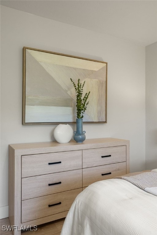 6142 Whiskey Creek Dr Unit 628, Fort Myers, FL 33919 - bedroom featuring wood finished floors