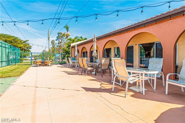 6142 Whiskey Creek Dr Unit 628, Fort Myers, FL 33919 - view of patio with outdoor dining area