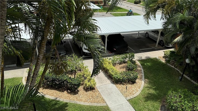 6142 Whiskey Creek Dr Unit 628, Fort Myers, FL 33919 - view of side of home featuring metal roof