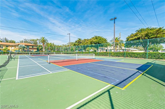 6142 Whiskey Creek Dr Unit 628, Fort Myers, FL 33919 - view of tennis court featuring community basketball court