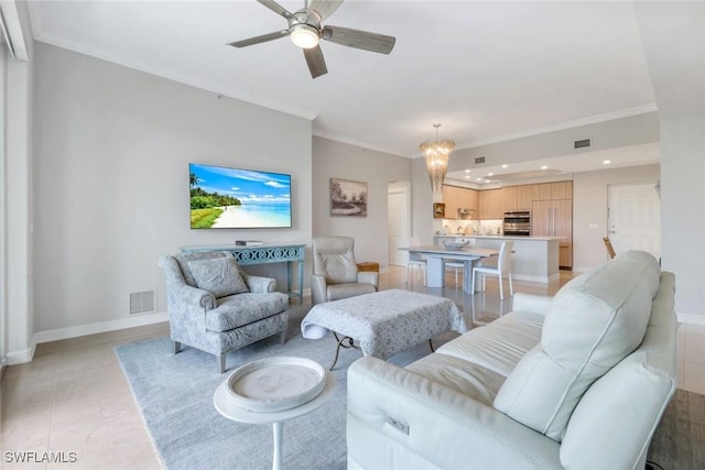 2728 Tiburon Blvd E Unit A403, Naples, FL 34109 - living area featuring a ceiling fan, recessed lighting, crown molding, and baseboards