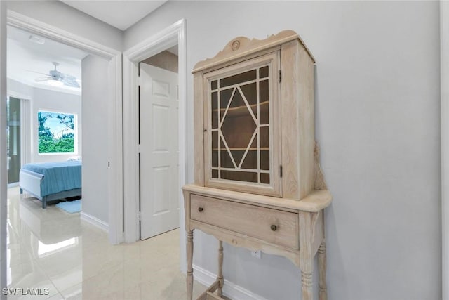 2728 Tiburon Blvd E Unit A403, Naples, FL 34109 - hallway featuring baseboards