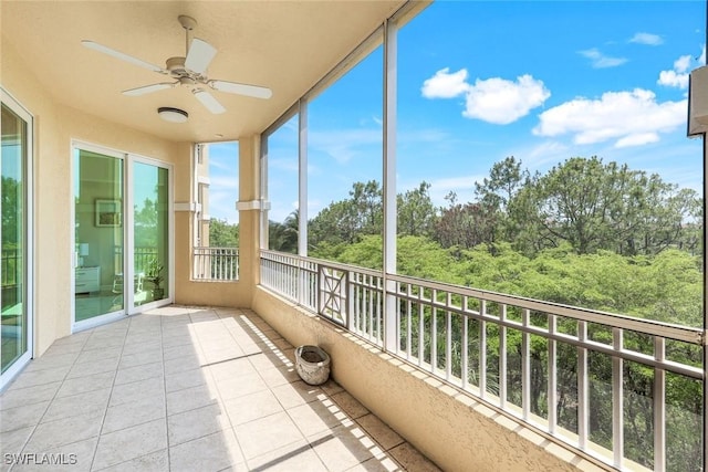 2728 Tiburon Blvd E Unit A403, Naples, FL 34109 - unfurnished sunroom with a ceiling fan and tile patterned flooring