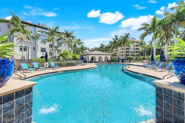 2728 Tiburon Blvd E Unit A403, Naples, FL 34109 - community pool with a patio area