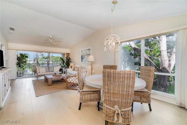 1160 Sarah Jean Cir Unit D204, Naples, FL 34110 - dining space featuring vaulted ceiling, a chandelier, light wood-style floors, and a ceiling fan