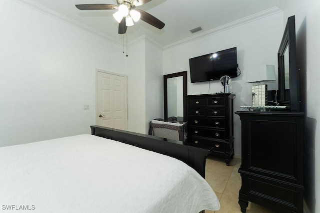 2140 8th St NE, Naples, FL 34120 - bedroom with crown molding, light tile patterned flooring, and ceiling fan