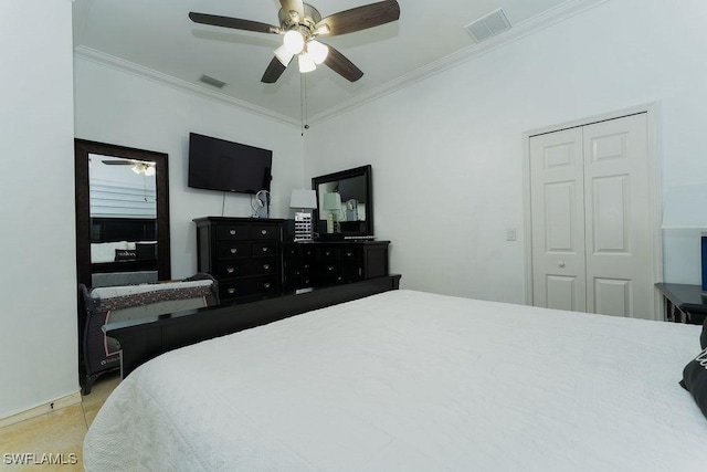 2140 8th St NE, Naples, FL 34120 - bedroom with ornamental molding, a ceiling fan, and a closet