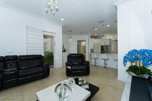 2140 8th St NE, Naples, FL 34120 - living room with crown molding, light tile patterned floors, and recessed lighting