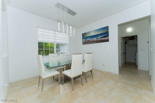2140 8th St NE, Naples, FL 34120 - dining area featuring ornamental molding, washer / clothes dryer, and baseboards