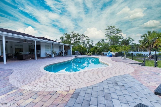 2140 8th St NE, Naples, FL 34120 - outdoor pool with an outdoor living space, a patio area, and a ceiling fan