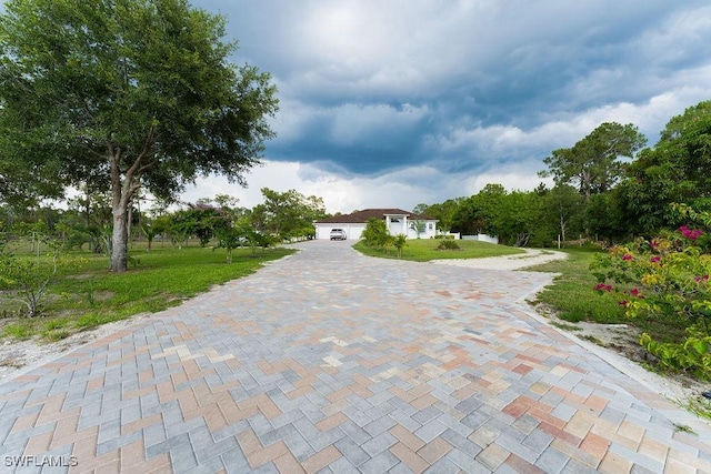 2140 8th St NE, Naples, FL 34120 - view of front of property with a front lawn
