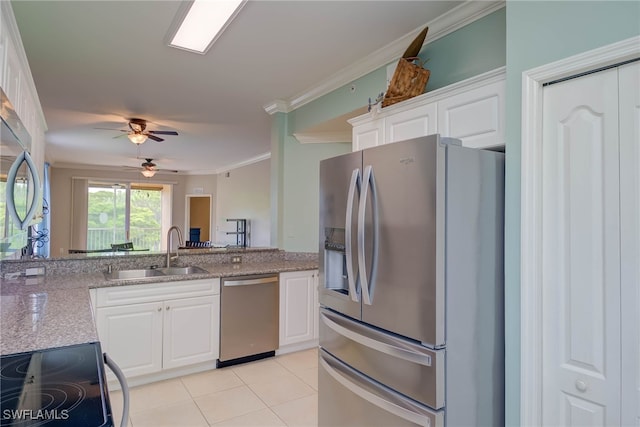 8320 Whiskey Preserve Cir Unit 321, Fort Myers, FL 33919 - kitchen with stainless steel appliances, a sink, white cabinetry, light stone countertops, and ornamental molding