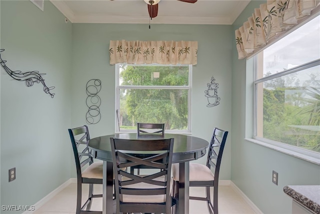 8320 Whiskey Preserve Cir Unit 321, Fort Myers, FL 33919 - dining space with a ceiling fan, ornamental molding, baseboards, and light tile patterned floors