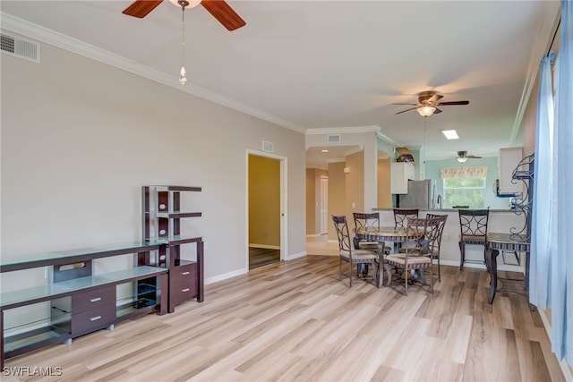 8320 Whiskey Preserve Cir Unit 321, Fort Myers, FL 33919 - dining space with ceiling fan, light wood-style flooring, crown molding, and baseboards