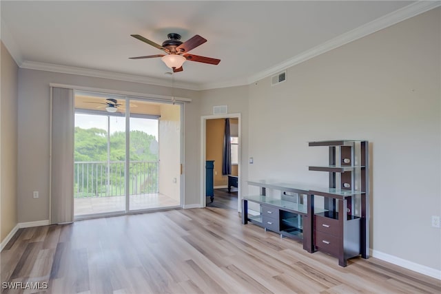 8320 Whiskey Preserve Cir Unit 321, Fort Myers, FL 33919 - unfurnished living room with ceiling fan, wood finished floors, baseboards, and crown molding