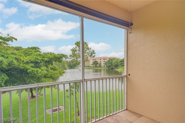8320 Whiskey Preserve Cir Unit 321, Fort Myers, FL 33919 - unfurnished sunroom featuring a water view