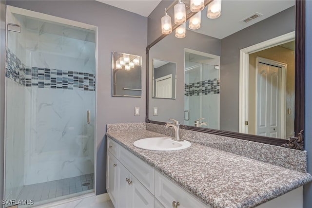 8320 Whiskey Preserve Cir Unit 321, Fort Myers, FL 33919 - bathroom with a chandelier, a marble finish shower, and vanity