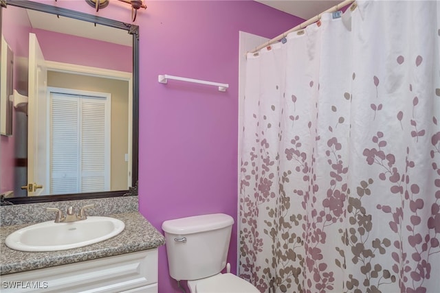 8320 Whiskey Preserve Cir Unit 321, Fort Myers, FL 33919 - bathroom with vanity, toilet, and a shower with shower curtain