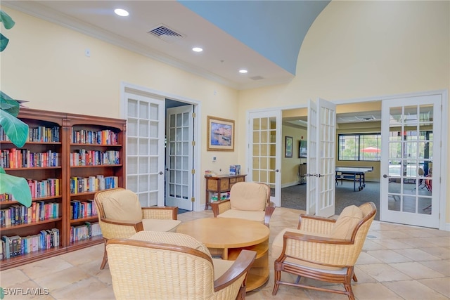 8320 Whiskey Preserve Cir Unit 321, Fort Myers, FL 33919 - sitting room with french doors, ornamental molding, light tile patterned floors, recessed lighting, and baseboards