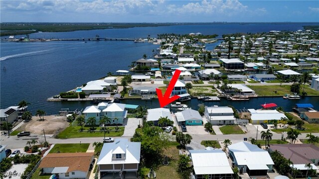 2685 Geary St, Matlacha, FL 33993 - aerial perspective of suburban area with a large body of water