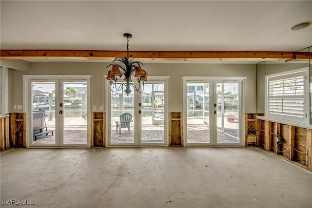 2685 Geary St, Matlacha, FL 33993 - unfurnished dining area with french doors, unfinished concrete floors, and healthy amount of natural light