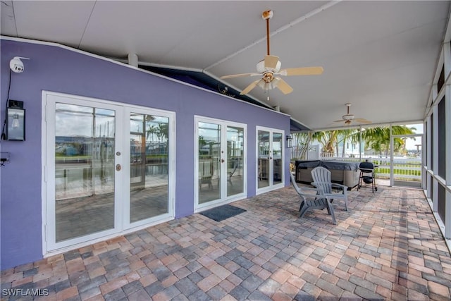 2685 Geary St, Matlacha, FL 33993 - sunroom with french doors, a ceiling fan, vaulted ceiling, and plenty of natural light