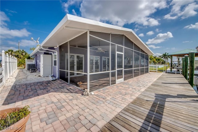 2685 Geary St, Matlacha, FL 33993 - back of house with a sunroom, a patio area, french doors, and a ceiling fan