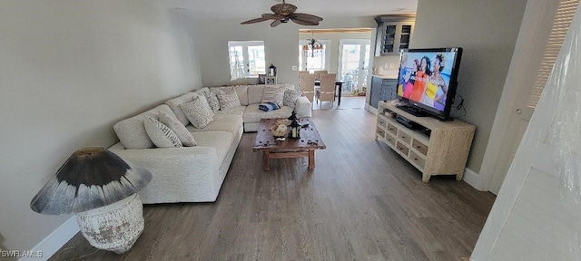 2685 Geary St, Matlacha, FL 33993 - living room featuring wood finished floors, a ceiling fan, and baseboards