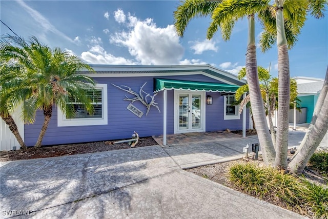 2685 Geary St, Matlacha, FL 33993 - view of front of home with french doors