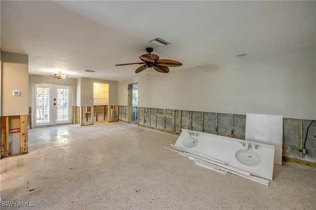 2685 Geary St, Matlacha, FL 33993 - unfurnished living room featuring a ceiling fan