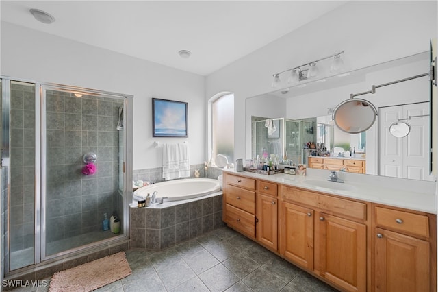 7384 Sika Deer Way, Fort Myers, FL 33966 - bathroom with vanity, tile patterned floors, a bath, and a stall shower