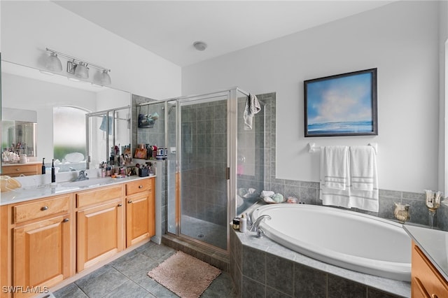 7384 Sika Deer Way, Fort Myers, FL 33966 - full bathroom with vanity, a bath, a stall shower, and tile patterned floors