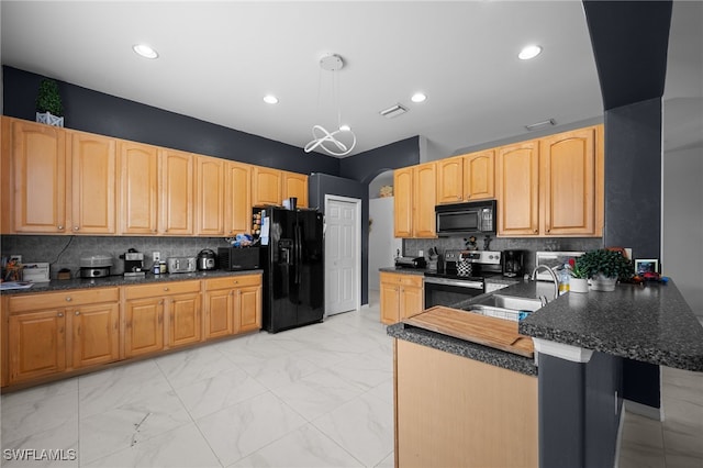 7384 Sika Deer Way, Fort Myers, FL 33966 - kitchen with black appliances, dark countertops, tasteful backsplash, a peninsula, and light brown cabinets