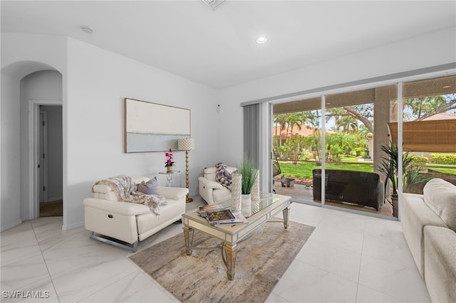 7384 Sika Deer Way, Fort Myers, FL 33966 - living room with arched walkways and recessed lighting
