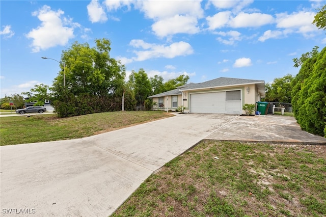 206 SE 12th Ter, Cape Coral, FL 33990 - ranch-style house featuring concrete driveway, stucco siding, and an attached garage