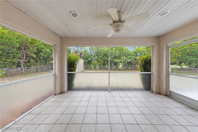 206 SE 12th Ter, Cape Coral, FL 33990 - unfurnished sunroom featuring ceiling fan and healthy amount of natural light