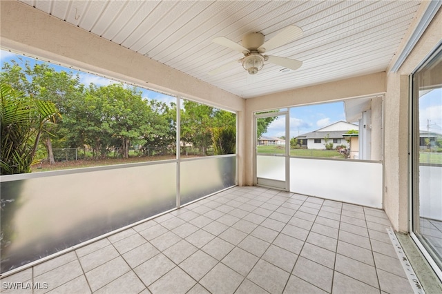 206 SE 12th Ter, Cape Coral, FL 33990 - unfurnished sunroom featuring ceiling fan
