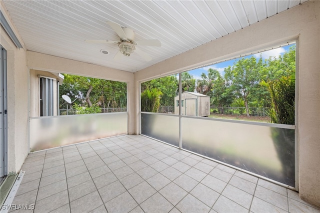 206 SE 12th Ter, Cape Coral, FL 33990 - unfurnished sunroom with a ceiling fan and healthy amount of natural light