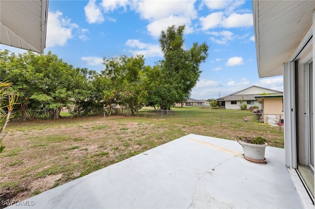206 SE 12th Ter, Cape Coral, FL 33990 - view of yard featuring a patio area