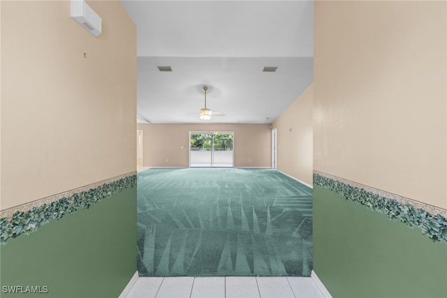 206 SE 12th Ter, Cape Coral, FL 33990 - spare room with carpet flooring, a ceiling fan, and baseboards