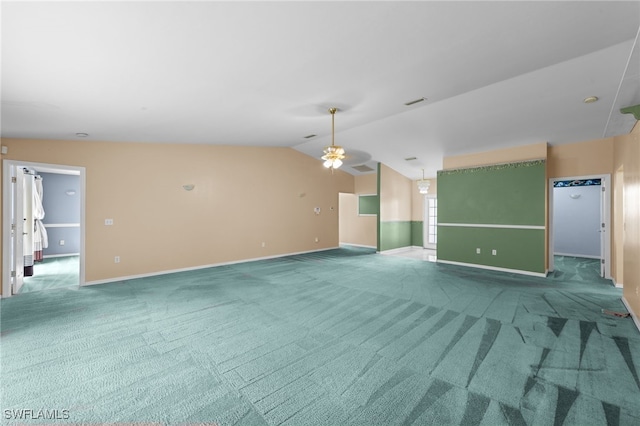 206 SE 12th Ter, Cape Coral, FL 33990 - carpeted spare room featuring baseboards, lofted ceiling, and a ceiling fan